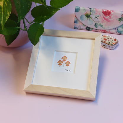 Herbier d'art fait avec des verveines pressées et séchées naturellement.  